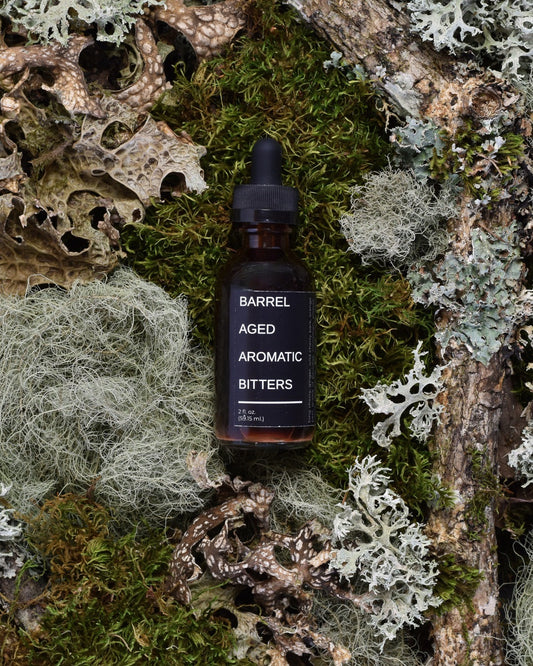 free-wild-she-bull-run-distillery-barrel-aged-aromatic-bitters-on-moss-whiskey